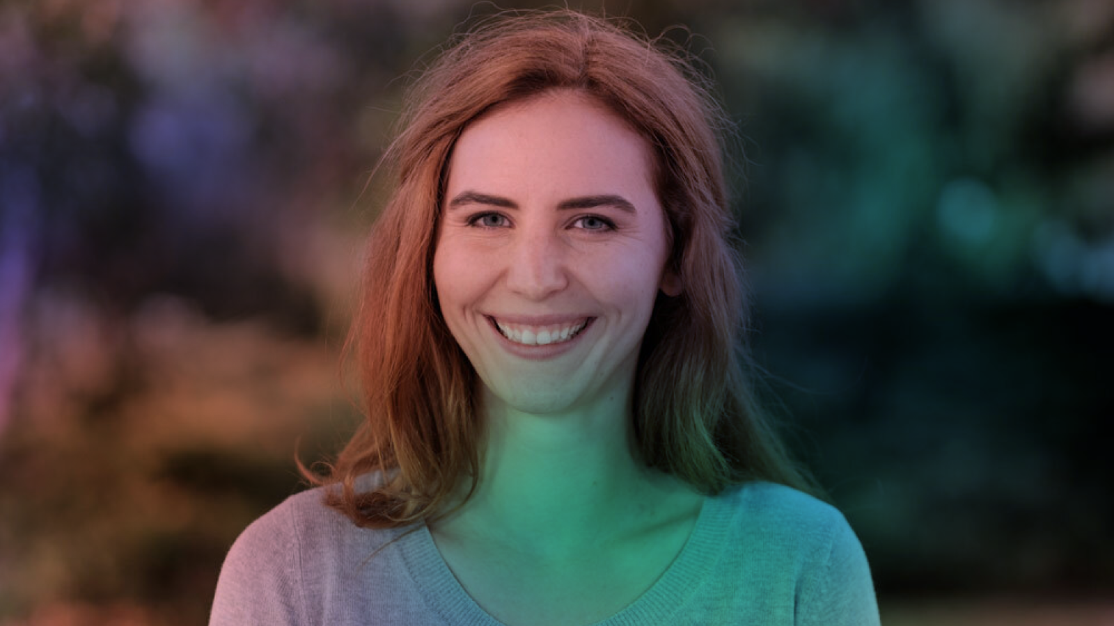 Portrait photo of a person smiling.